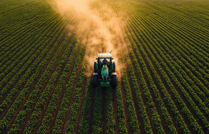 tractor-working-green-field